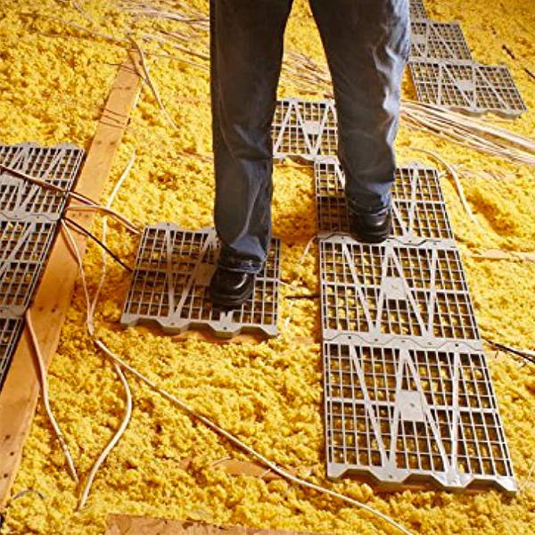 Attik Dek attic flooring system installed above insulation for safe attic storage