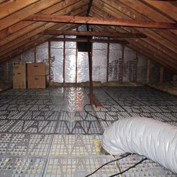 Attik Dek attic flooring installed in an attic to create raised storage space